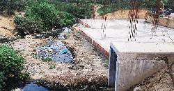 সাপাহারে সরকারি জায়গা দখল করে অবৈধ স্থাপনা নির্মাণ